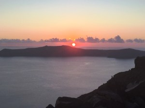 Sun setting over santorini